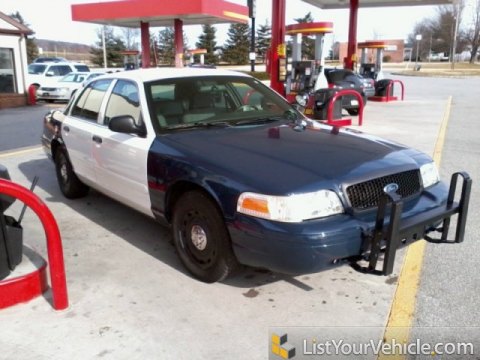 Vibrant White 2005 Ford Crown Victoria Police Interceptor with Dark Charcoal